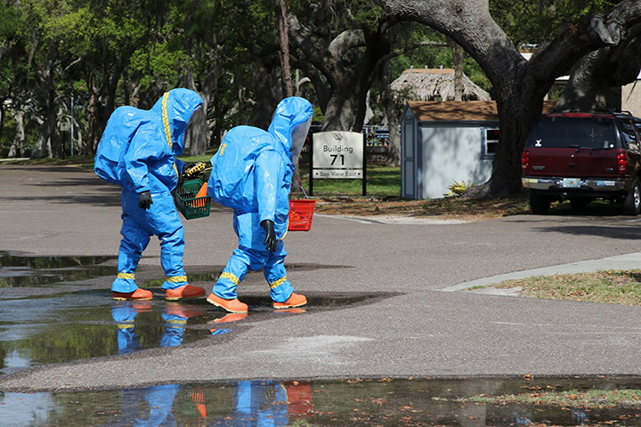 Firefighter in blue hazmat suit