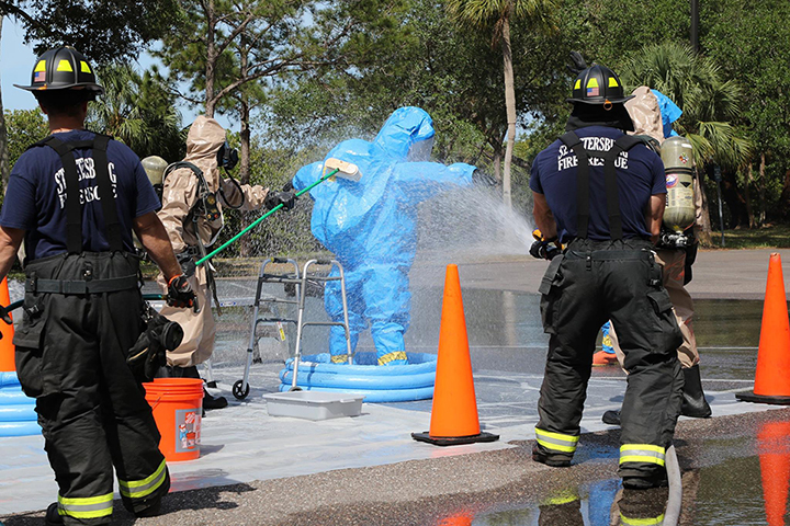 Decontamination of a hazmat suit