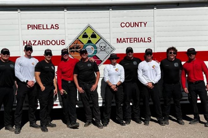 Hazmat team members in front of hazmat trailer; Pinellas County Hazardous Materials